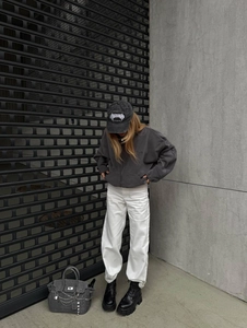 Oversized dark gray fleece zip-up hoodie with embroidery in industrial street style