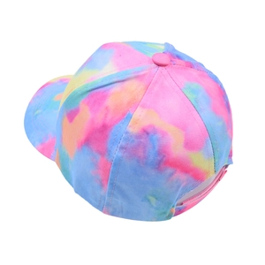 Top view of tie-dye baseball cap showing pink, yellow, and blue cotton canvas textures