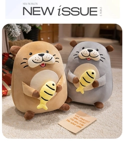 Detailed view of plush otter dolls in brown and gray holding small fish on a cozy carpet