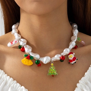 Festive Christmas necklace with pearls, snowman and Santa pendants on model