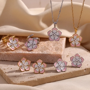 Three-layer pearl flower jewelry set with necklaces, rings, and earrings in 18K gold finish