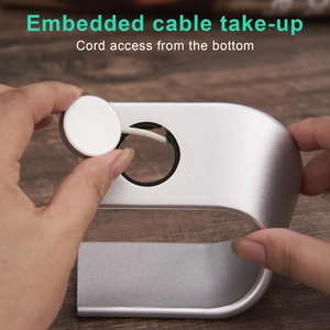 Silver aluminum Apple Watch stand with hidden cable management and bottom cord access