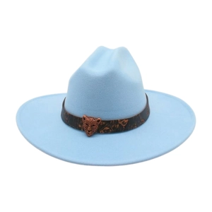 Close-up of light blue felt fedora hat featuring a vintage bronze leopard head metal emblem