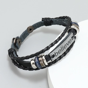 Men's layered black woven leather bracelet with blue beads and a Believe engraved metal plate