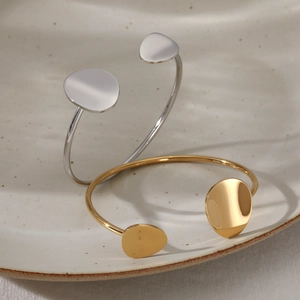 Minimalist C-shaped stainless steel open bracelet set in gold and silver finish