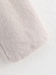 Detailed close-up showing the soft texture and gray color of the faux fur jacket collar
