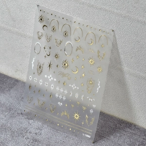 Self-adhesive bronzing nail stickers with celestial sun moon and star patterns