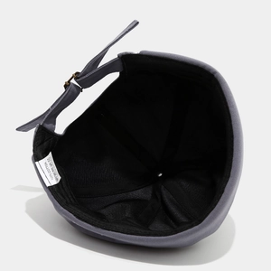 Deep grey cotton docker cap with adjustable metal buckle and black inner lining