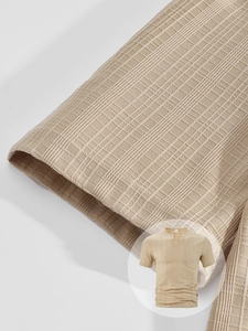 Detail of men's V-neck waffle knit short sleeve shirt with texture and chest pocket