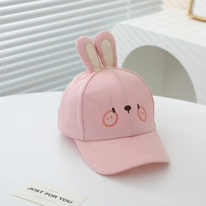 Close-up of pink toddler baseball cap with 3D bunny ears and cute facial embroidery