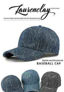 Detailed view of textured denim baseball caps in dark blue, light blue, and grey colors