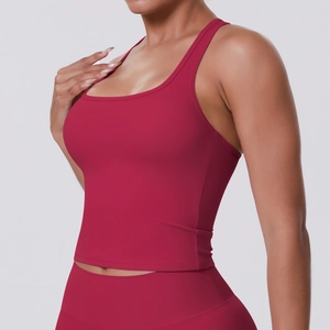 Detail view of deep red racerback sports vest with moisture-wicking brushed fabric