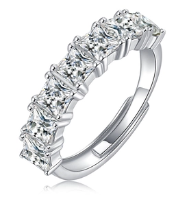 Macro detail of adjustable silver ring featuring seven princess cut moissanite stones