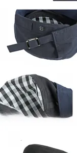 Détail de la doublure chaude double couche avec motif à carreaux noir et blanc du béret
