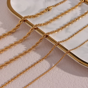 Detail view of 18K gold plated stainless steel twisted rope chains in multiple thicknesses