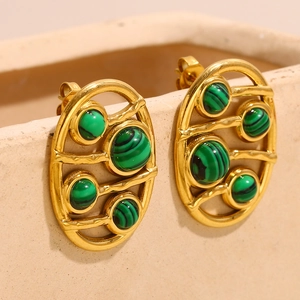 Macro detail of 18K gold plated hollow oval earrings with green malachite stone inlays