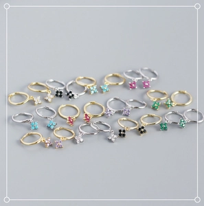 Detailed array of S925 sterling silver clover earrings in gold and silver finishes