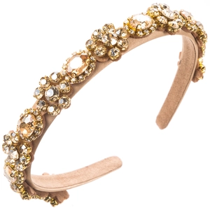 Macro shot of luxury crystal floral headband with champagne rhinestones on fabric base