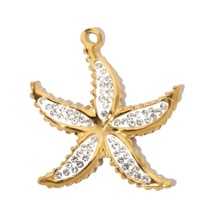 Detailed close-up of golden starfish pendant with white enamel and sparkling rhinestones