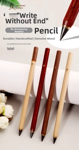 Detail of four handmade natural wood inkless pencils in walnut and maple finishes