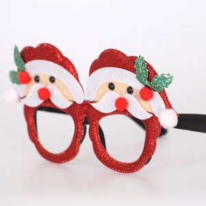 Detail of Christmas glasses with sequin frame and felt Santa Claus decorative elements