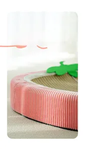 Detail of pink corduroy fabric and durable sisal texture on strawberry cat scratcher bed