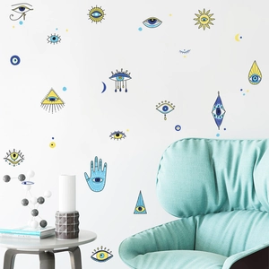 Hamsa Hand and Eye of Horus wall decals decorating a modern living room interior