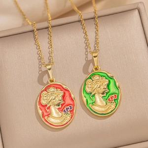 Vintage cameo portrait necklace with enamel pendant in red and green colors