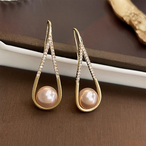 Water-drop hollow earrings with pink pearl and crystal in gold-tone finish
