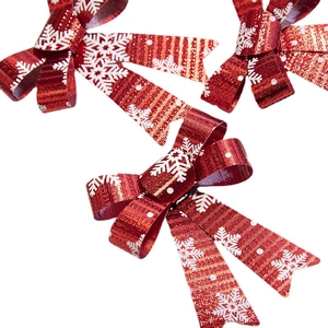 Red Christmas tree bows with white snowflakes and gold accents for holiday decor