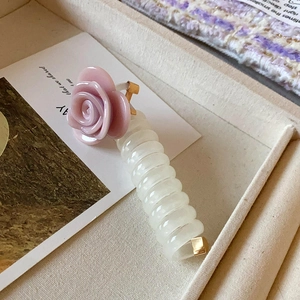 Sweet phone wire hair tie with pink rose flower, stylish fresh hair accessory for women.
