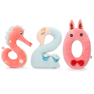 Three-piece plush toy set featuring a pink seahorse, blue swan, and pink rabbit pillow
