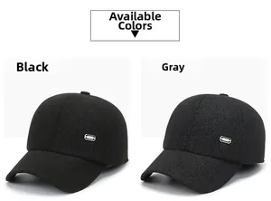 Detail view of winter baseball caps in black and grey with silver metal buckles