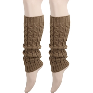 Macro detail of brown chunky knit leg warmers showing classic cable stitch pattern