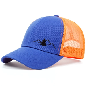 Detail of blue and orange mesh trucker hat with mountain pine tree embroidery