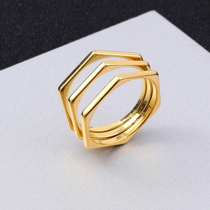 Three-layer gold geometric ring with hexagonal design in polished stainless steel for women