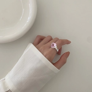 Elegant 925 sterling silver ring featuring a large pink heart-shaped zircon gemstone
