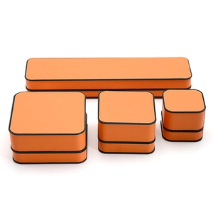 Premium orange jewelry gift box set with black trim for rings and necklaces