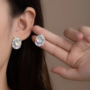 Detail of square vintage oil painting pearl earrings with green enamel and silver frame