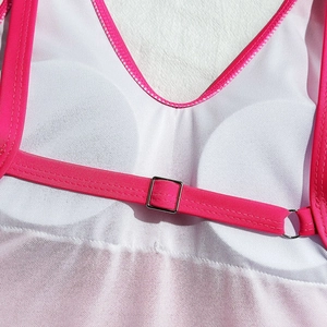 Detail of hot pink adjustable bikini strap with metal buckle and breathable mesh lining