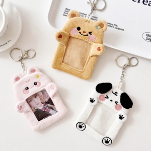 Plush animal card holders featuring a brown bear, pink bunny, and black dog with keychains