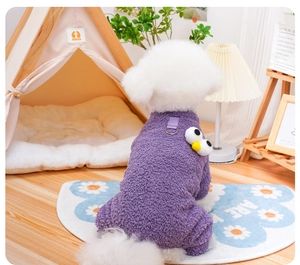 Close-up of purple coral fleece dog onesie with harness D-ring and cute plush eye detail