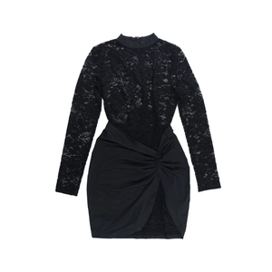 Detail of black lace bodice with floral patterns and waist knot on a long sleeve dress