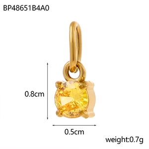 Detail view of yellow round-cut zircon pendant with golden clasp and size measurements