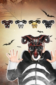 Detailed view of 3D devil masks with horns in red, gold, silver and black colors