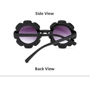Detail view of flower-shaped kids' sunglasses with black frame and purple gradient lenses