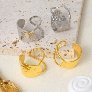 Detail of adjustable 18k gold plated stainless steel rings with hammer texture finish