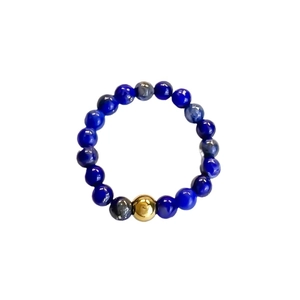 Elastic stainless steel ring with dark blue natural stone beads and gold accent bead