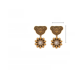 Detailed specs of vintage bear and flower earrings with copper and zircon material