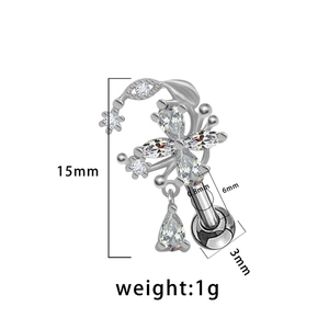 Detail view of heart zircon tragus piercing with 15mm length and 0.8mm gauge size